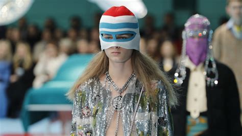 gucci fashion girl holding head|Gucci Sent Models Down the Runway Carrying Their Own.